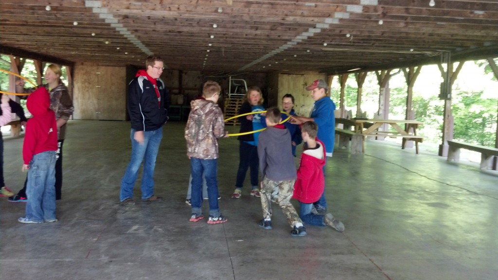 Blake assists youth with leadership activities.