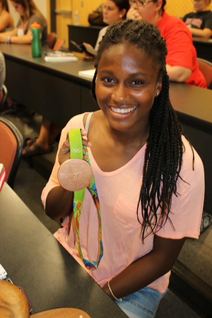 Nichelle Prince poses with her Bronze Medal from the 2016 Rio Olympics.