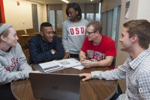 Diverse group of Ohio State students working together on an assignment