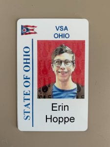 State of Ohio, VSA Ohio, Erin Hoppe; woman with short brown hair, glasses, smiling, blue shirt, black cardigan