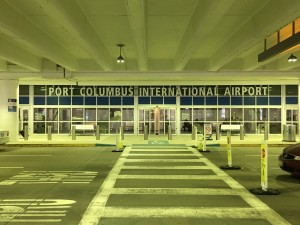 Port Columbus International Airport is the major airport for central Ohio. Columbus is a city full of diversity and a variety of cultures, which is represented by this hub for international and domestic travel. This is the place where often a lot of families and students come to begin their life in a new city. The multiple lanes suggest the airport is well equipped for heavy traffic, and can get busy. In the picture the airport does not appear to be crowded with people, which could be due to the time of year, week, or day this photo was taken; travel congestion varies often.