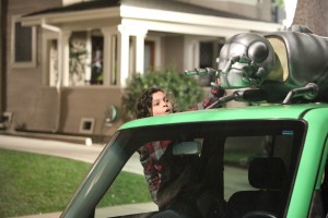 Max looking incredibly happy as he reaches for a plastic bug on top of a car. Bugs are one of Max's favorite things. He knows a lot of facts about them and often shares them throughout the show.