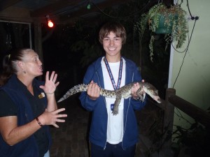 Me holding a baby alligator