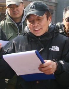 Huang Jianxin on the set of The Founding