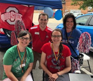 Staff & Faculty at the PRIDE festival table 2019.