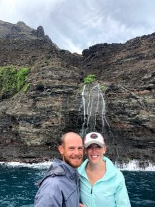 photo of Amanda and her husband at a waterfall