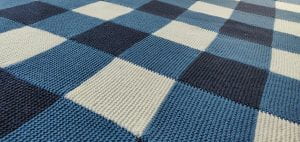 blue and white gingham knitted blanket