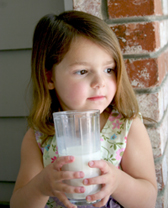 image of girl drinking milk