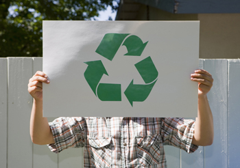 Image of person holding recycling sign 3