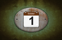 Old wooden calendar with October 1.