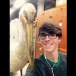 Grant next to an American White Pelican