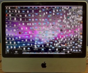 Image of desktop clutter on a iMac
